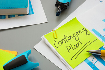 Business Contingency plan papers and notepad on the table. © Vitalii Vodolazskyi