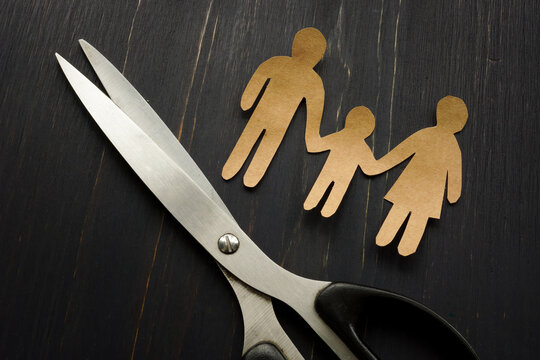 Parental Alienation Concept. Figures Of Family And Scissors As Symbol Of Divorce.