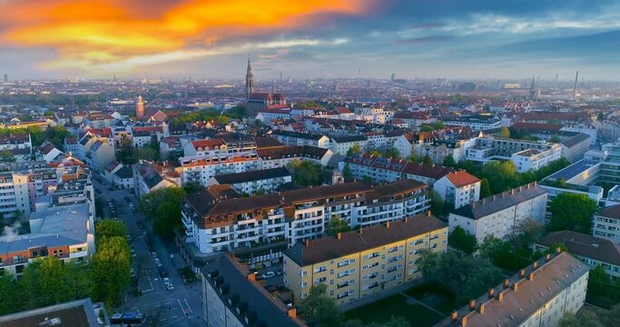 Munich germany beutiful sunrise, munich skyline aerial view drone footage colored sky view of downtown church marienplatz city centre at morning 4k aerial.