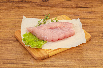 Raw turkey breast steak for cooking