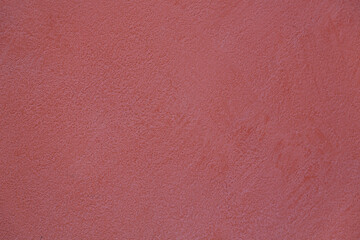 Pink concrete wall texture. Painted fuchsia red cement wall background