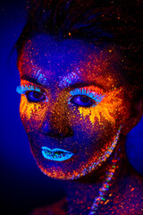 close up uv portrait glowing in a dark