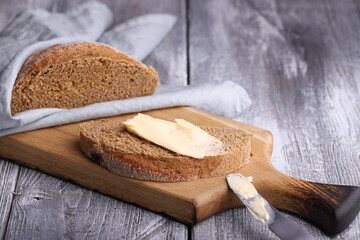A sandwich with rye bread and butter, delicious and healthy food.