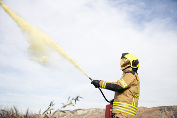 firefighter man in front of fire