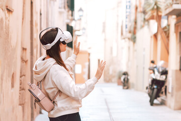 Woman wearing vr headset in european city street, virtual travel, virtual sightseeing concept....