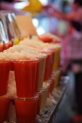Chilled fruit cocktails at the food market
