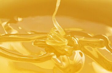 flowing bee yellow honey background
