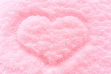 Fototapeta na wymiar a heart drawn in the snow