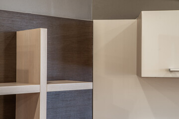 Close-up of empty wooden shelf. Modern interior of living room.