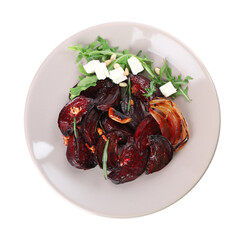 Roasted beetroot slices with feta cheese and arugula isolated on white, top view