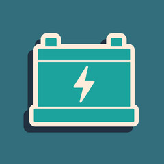 Green Car battery icon isolated on green background. Accumulator battery energy power and electricity accumulator battery. Long shadow style. Vector.