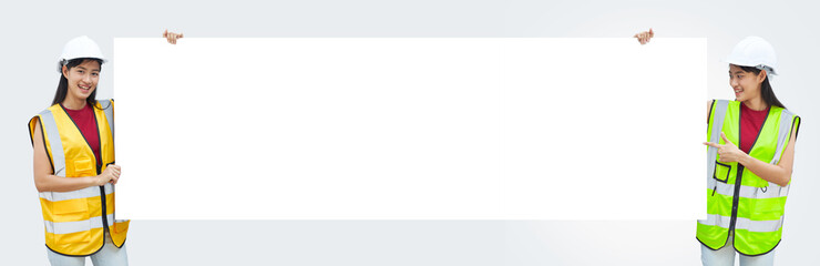 A female engineer holding a paper placard on white background.