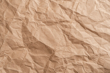 Abstract wrinkled wrinkled texture of wrapping brown paper