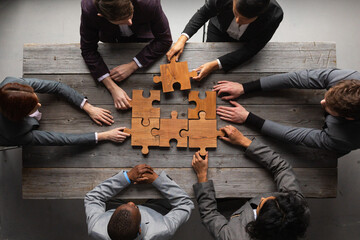 Business teamwork with puzzle - 411806855