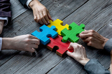 Business teamwork with puzzle