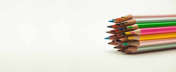 Fototapeta premium colored pencils on a white background. education concept. illustration of training.