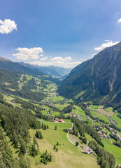 Obraz premium Aerial drone shot of Helligenblutt village in Grossglockner mountain valley in Austria