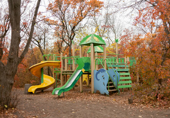 Playground in the autumn forest or park