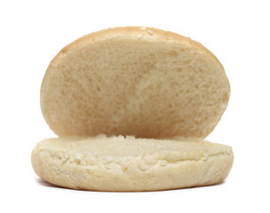 Burger bun with sesame seeds isolated on white background