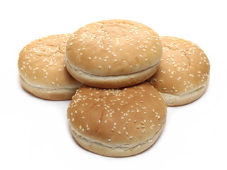 Burger buns with sesame seeds isolated on white background
