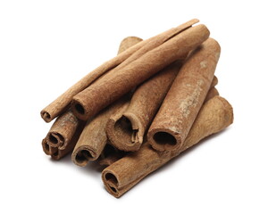Cinnamon sticks pile isolated on white background