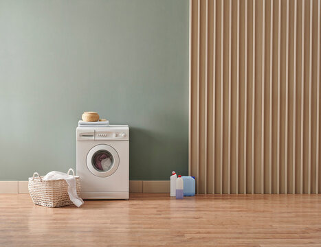 Washing Machine In The Green And Wooden Wall Style With Dirty Clothes, Laundry Room Style With Detergent.