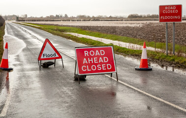 Road ahead closed and flood warning signs on the road to Cawood Bridge in Selby, North Yorkshire...