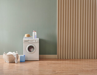 Washing machine in the green and wooden wall style with dirty clothes, laundry room style with detergent. - obrazy, fototapety, plakaty