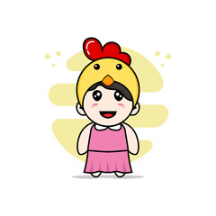 Obraz premium Cute girl character wearing chicken costume.