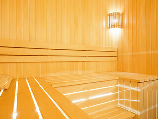 Fototapeta na wymiar wooden sauna interior wood-fired sauna with LED lighting