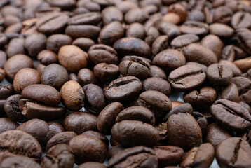 Background image with roasted brown coffee beans
