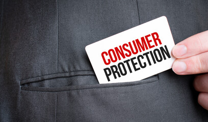 Card with CONSUMER PROTECTION text in pocket of businessman suit. Investment and decisions business...