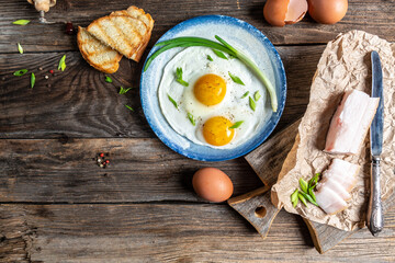 Scrambled eggs with pork lard. Ukrainian or belorussian food. Delicious breakfast or snack, top view