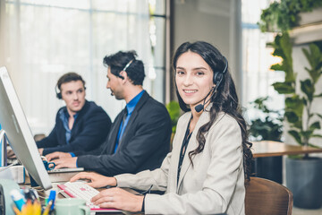 Beautiful Caucasion women on Tele Marketing representative or sales agents sitting at workplace...