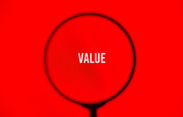 Word value on red screen through magnifying glass.