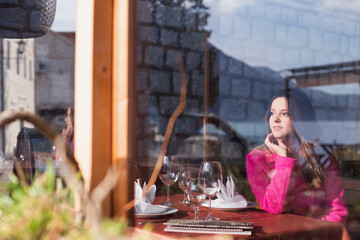 Beautiful young girl resting on the sea
