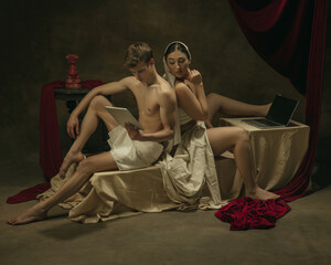 Peeking of what man do. Modern remake of classical artwork with modern tech theme - young medieval...