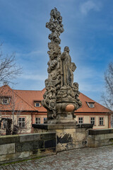 Fototapeta na wymiar Statue on the famous Charles bridge in Prague, Czech republic