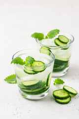Summer sparklers, cucumber iced cocktail. Space for text.