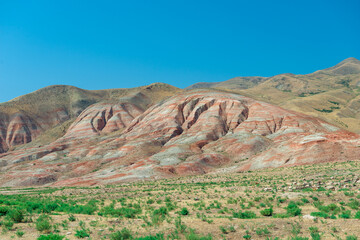 Cross-bedding in Candy Cane Mountains in Azerbaijan. Colorful stripes of the hills. Shale striped mountains.