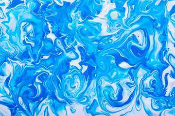 Free flowing blue and white acrylic paint 2. Random Waves and Curls. Abstract marble background or texture.