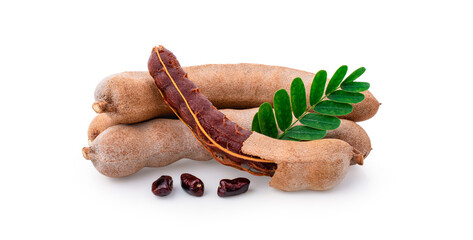 fresh tamarind fruits and leaves isolated on white background