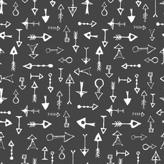 Vector hand drawn seamless pattern with different arrows. Black and white repeated texture with arrows. Hand-drawn background.