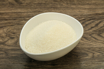 White sugar in the bowl