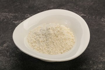 Wheat flour heap in the bowl