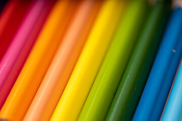 Colored pencils background. Color pencils on white background.