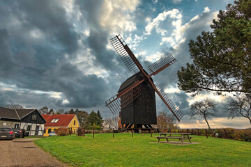 Fototapeta na wymiar Old windmill in Stovby on Falster in rural Denmark