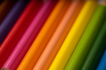 Colored pencils background. Color pencils on white background.