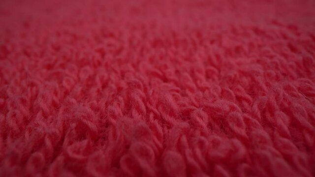Macro pink towel texture background.