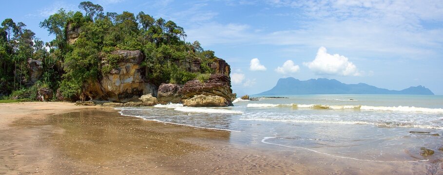 Sandy beach (Telok Paku) with rocks in Bako National Park, Borneo, Sarawak, Malaysia